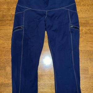 Athleta Navy Performance Leggings with Contrast Stitching and zipper pockets